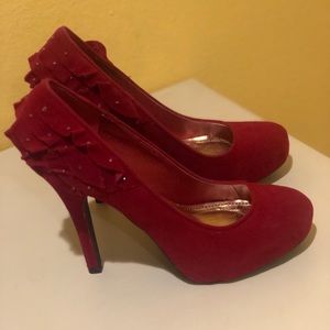 Red high heel pumps